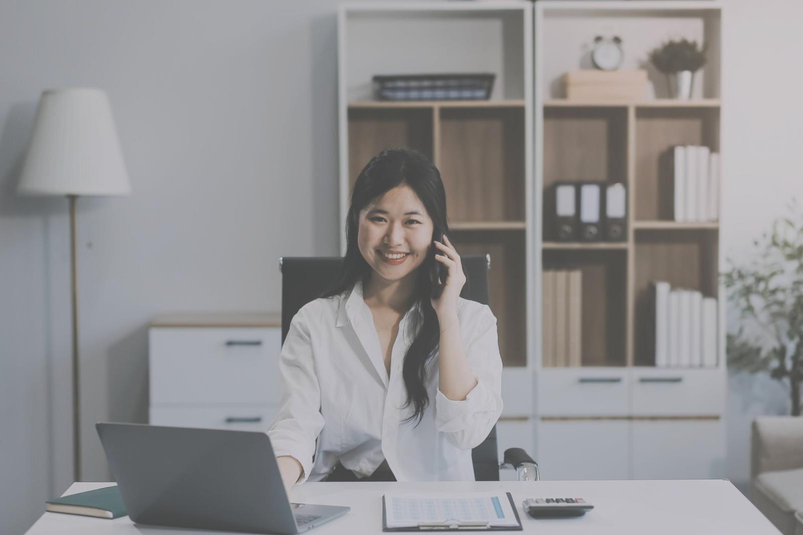 Financial analysis workspace with charts and documents